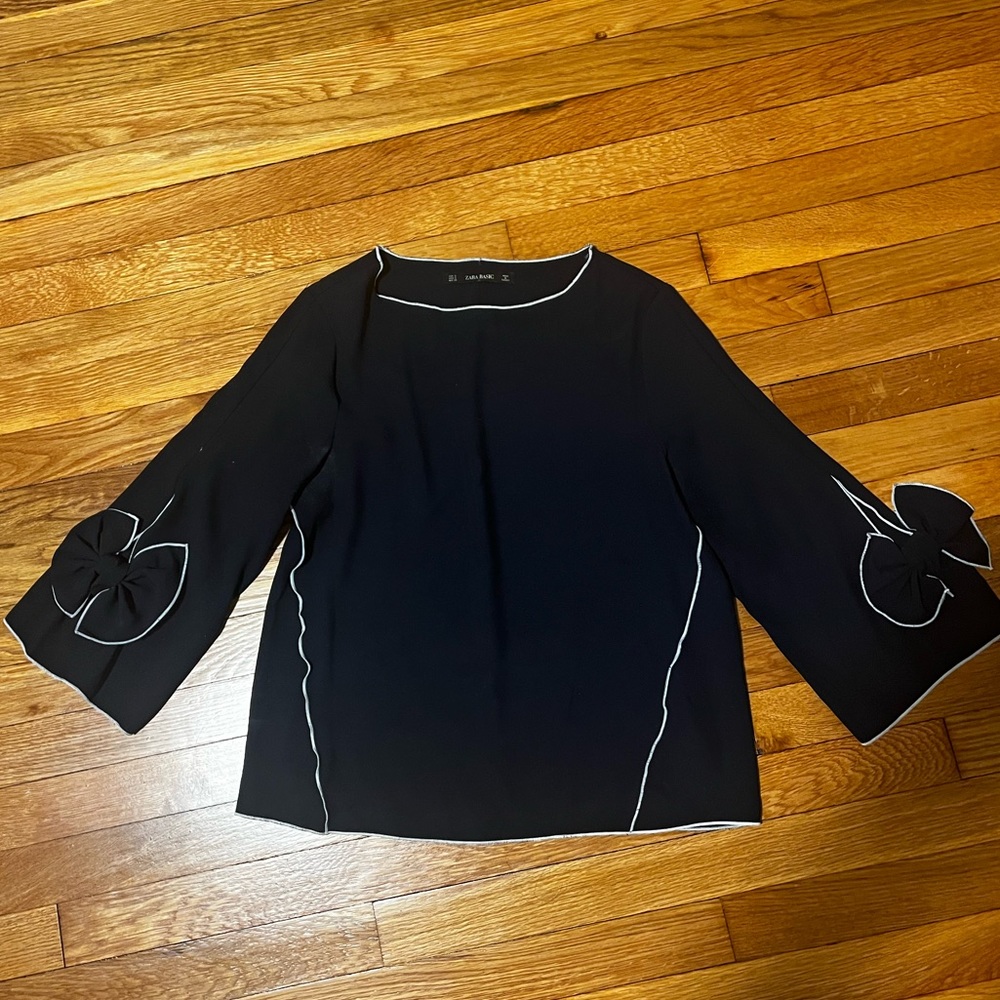 Zara navy blue blouse with whit stitching. Bows on sleeve
